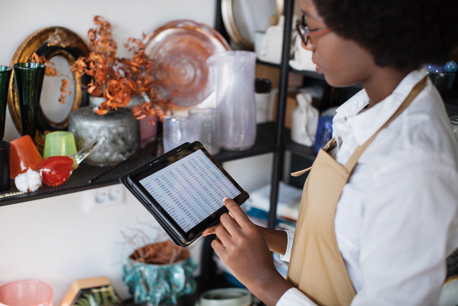 store manager with digital checklist