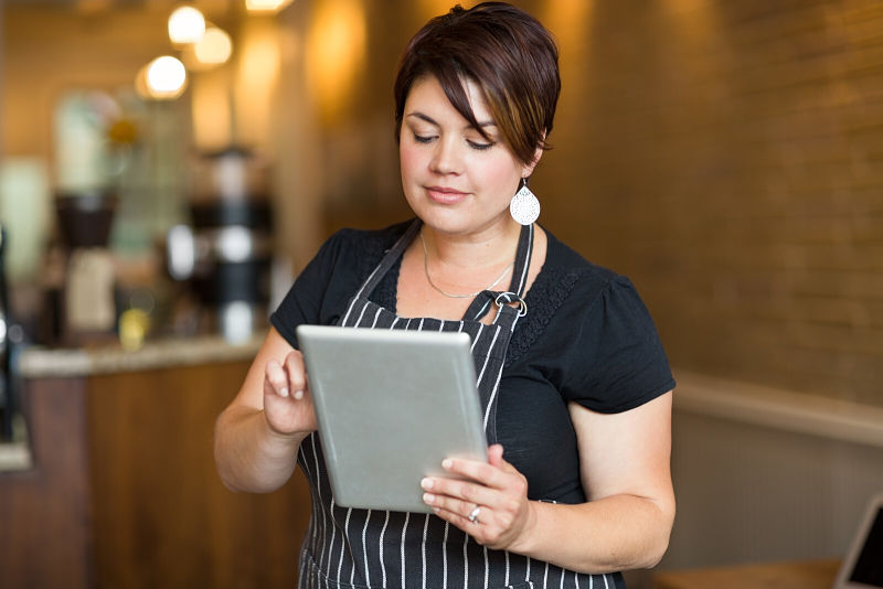 woman using tablet